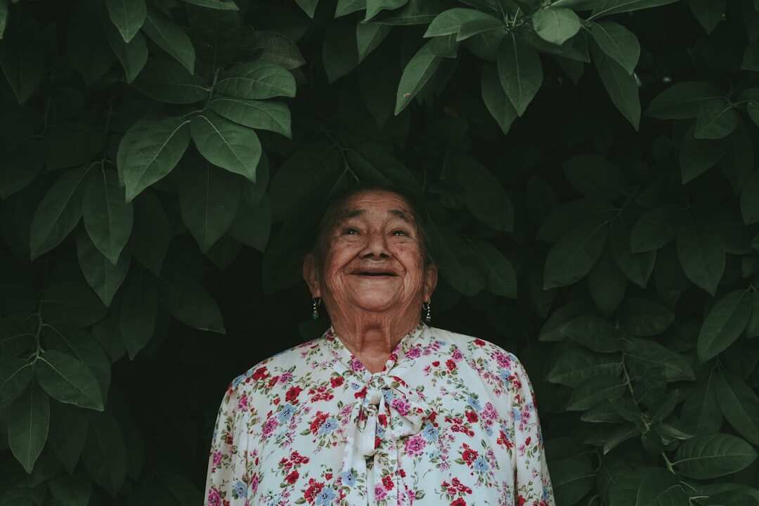 Studio portrait of a smiling older Dutch woman in her sixties